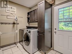 Walk-through from Garage - Mudroom & Laundry Room -