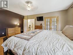 Primary Bedroom has French Doors to Walk-in Closet -