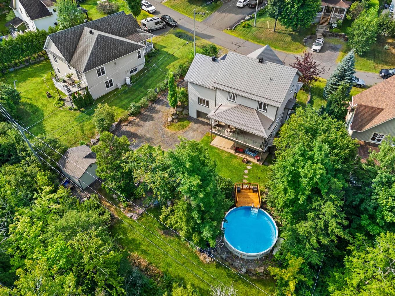 Photo aérienne - 182 Rue De Saguenay, Bromont, QC - Outdoor With Above Ground Pool