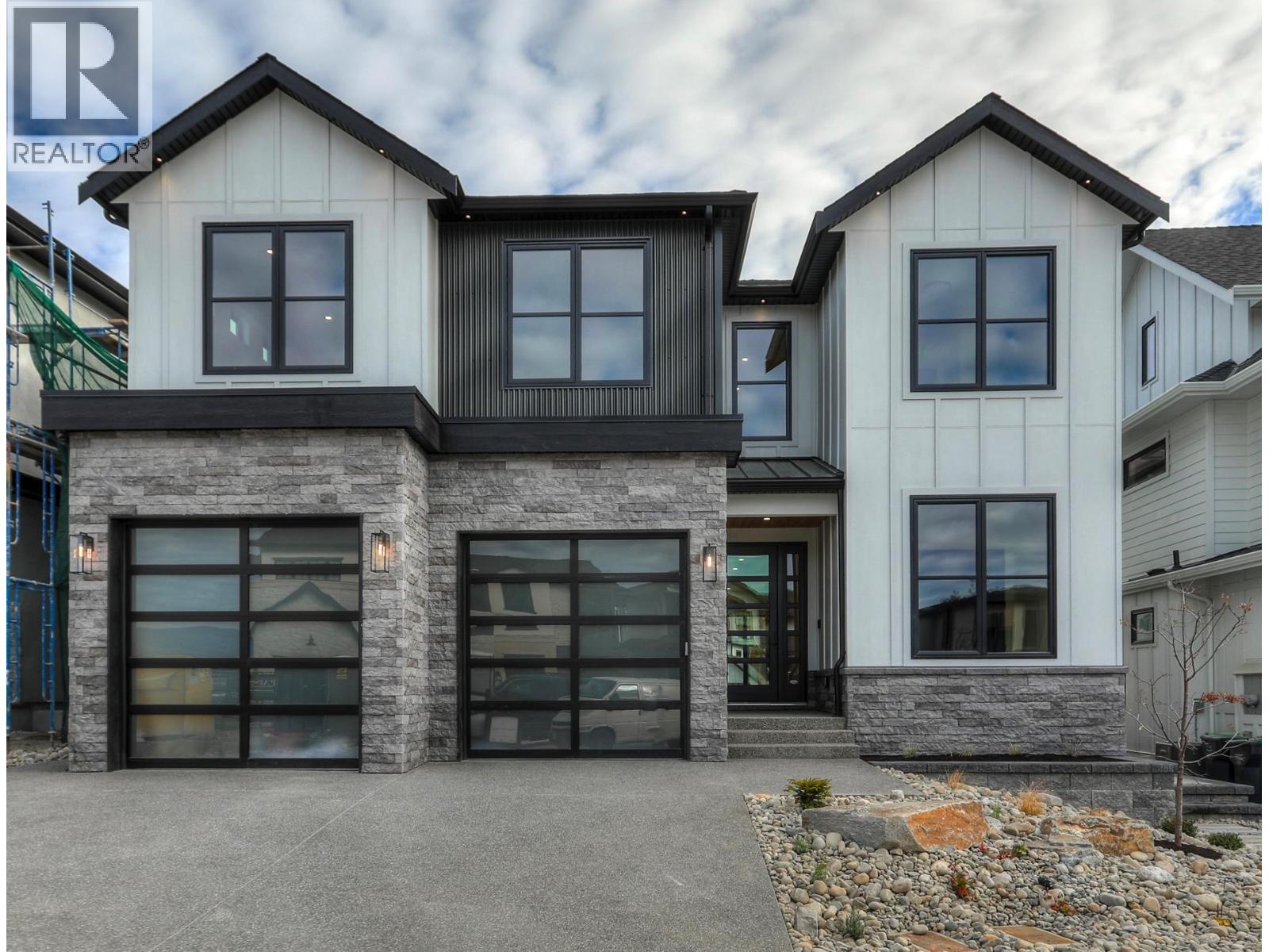 Modern Farmhouse: Timeless Charm Meets Contemporary Luxury - 5533 Foothill Court, Kelowna, BC - Outdoor With Facade