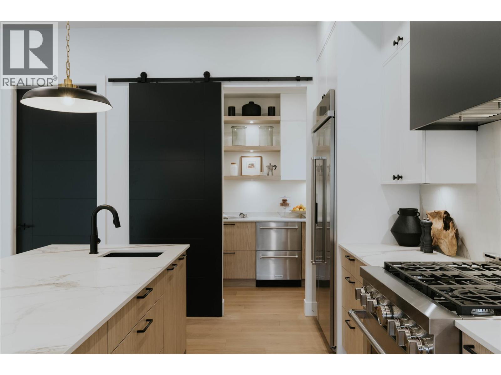 Spacious walk in pantry with additional refrigerator drawers and cabinetry - 5533 Foothill Court, Kelowna, BC - Indoor Photo Showing Kitchen