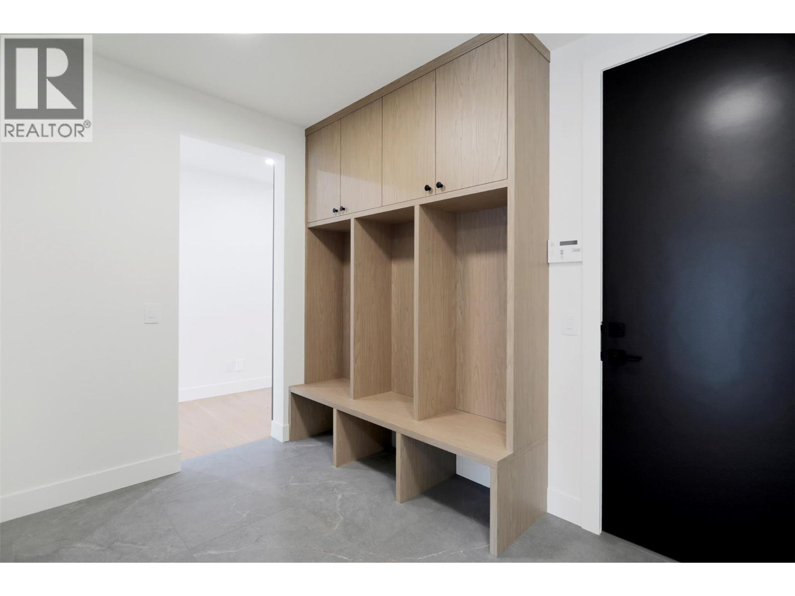 Mudroom with ample storage and a spacious closet - 5533 Foothill Court, Kelowna, BC - Indoor Photo Showing Other Room