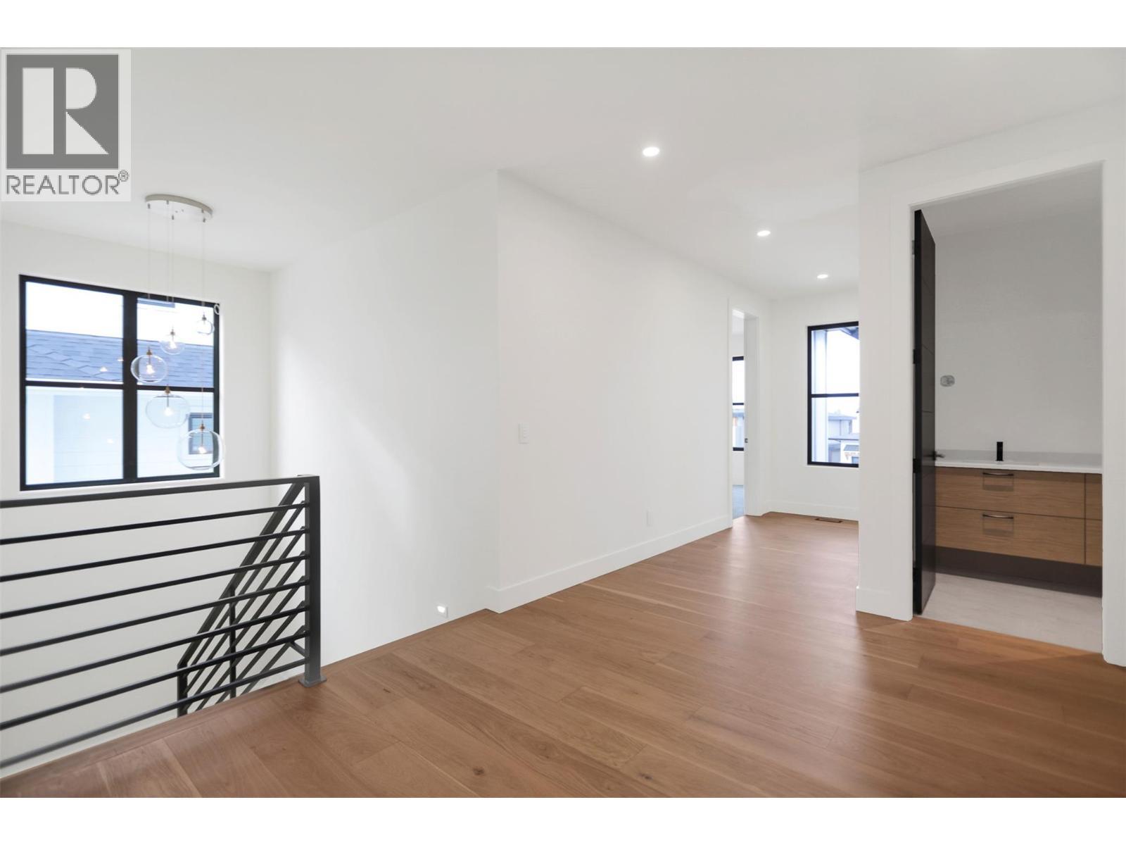 Upper landing area - 5533 Foothill Court, Kelowna, BC - Indoor Photo Showing Other Room