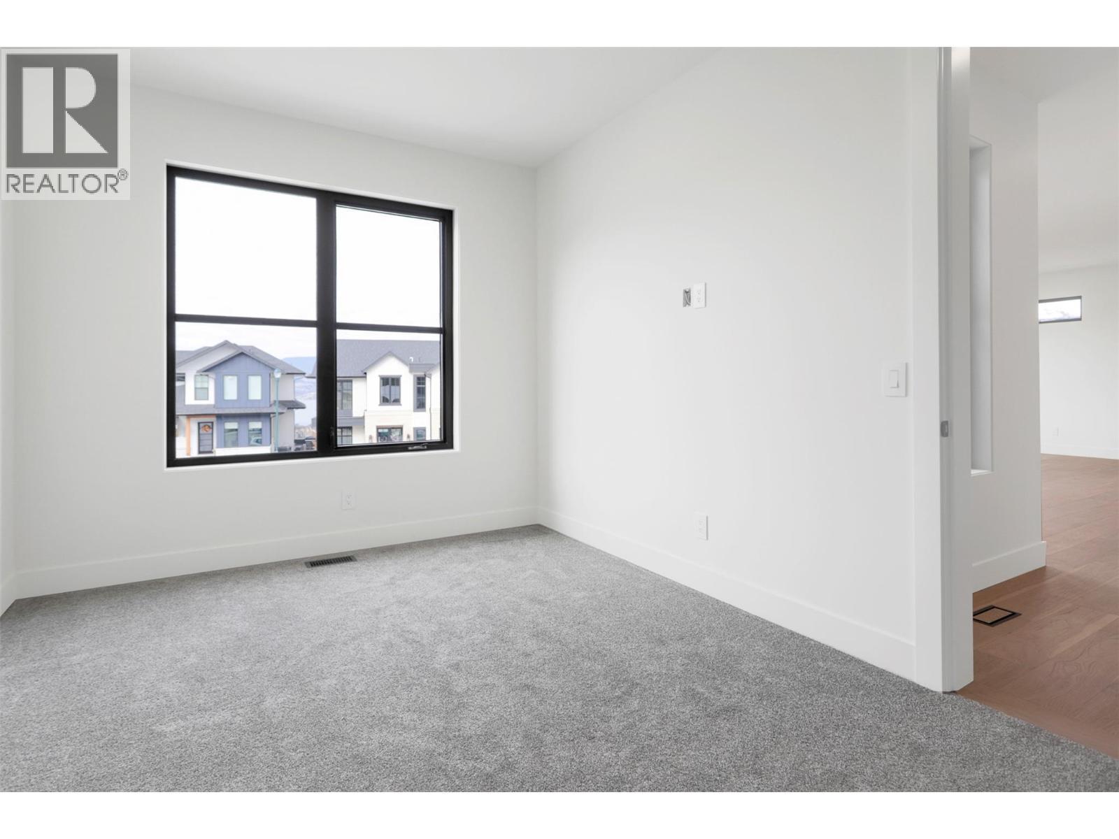Bedroom 1 on upper - 5533 Foothill Court, Kelowna, BC - Indoor Photo Showing Other Room
