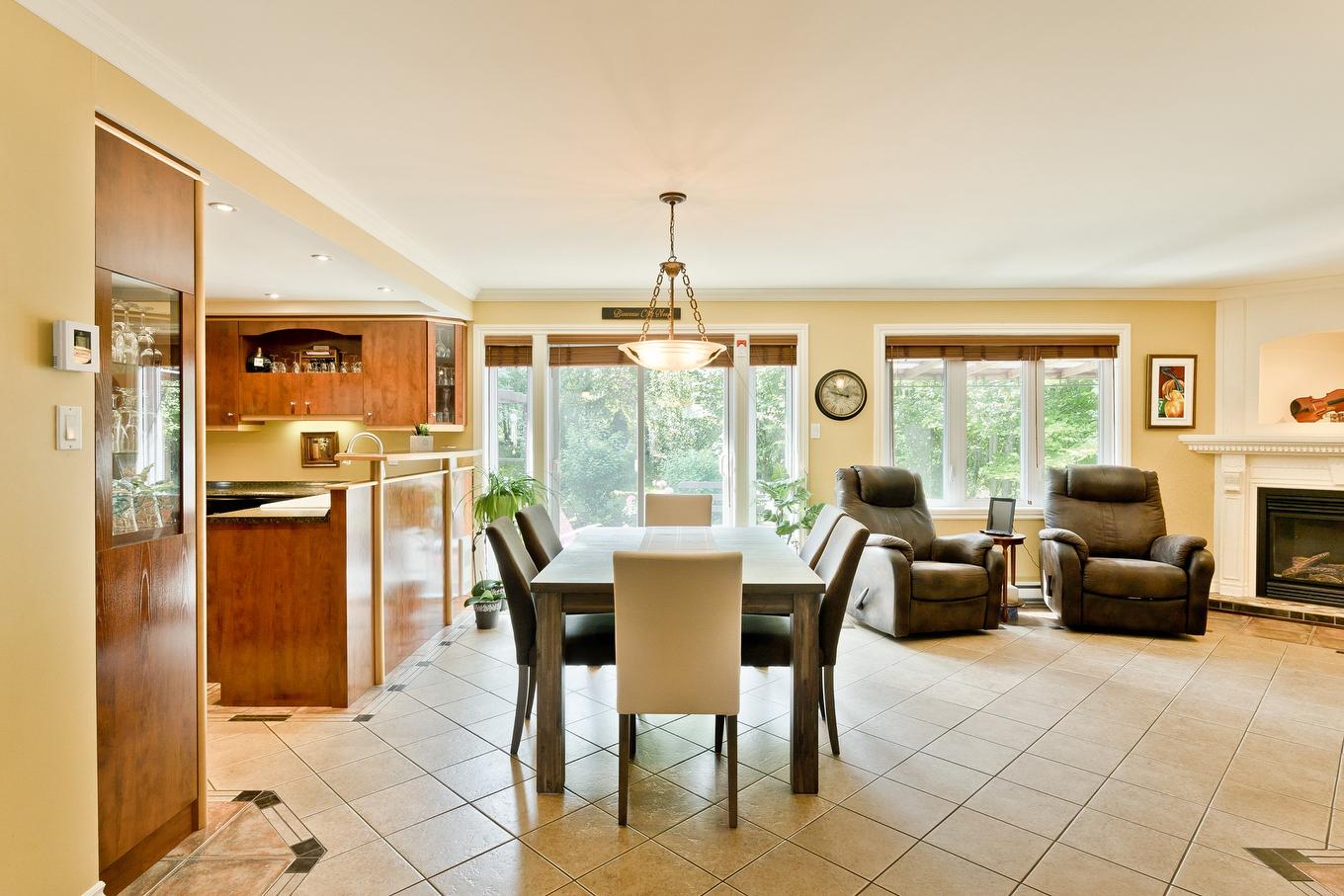 Dining room - 265 Rue Rolland-Dion, Magog, QC - Indoor Photo Showing Dining Room With Fireplace