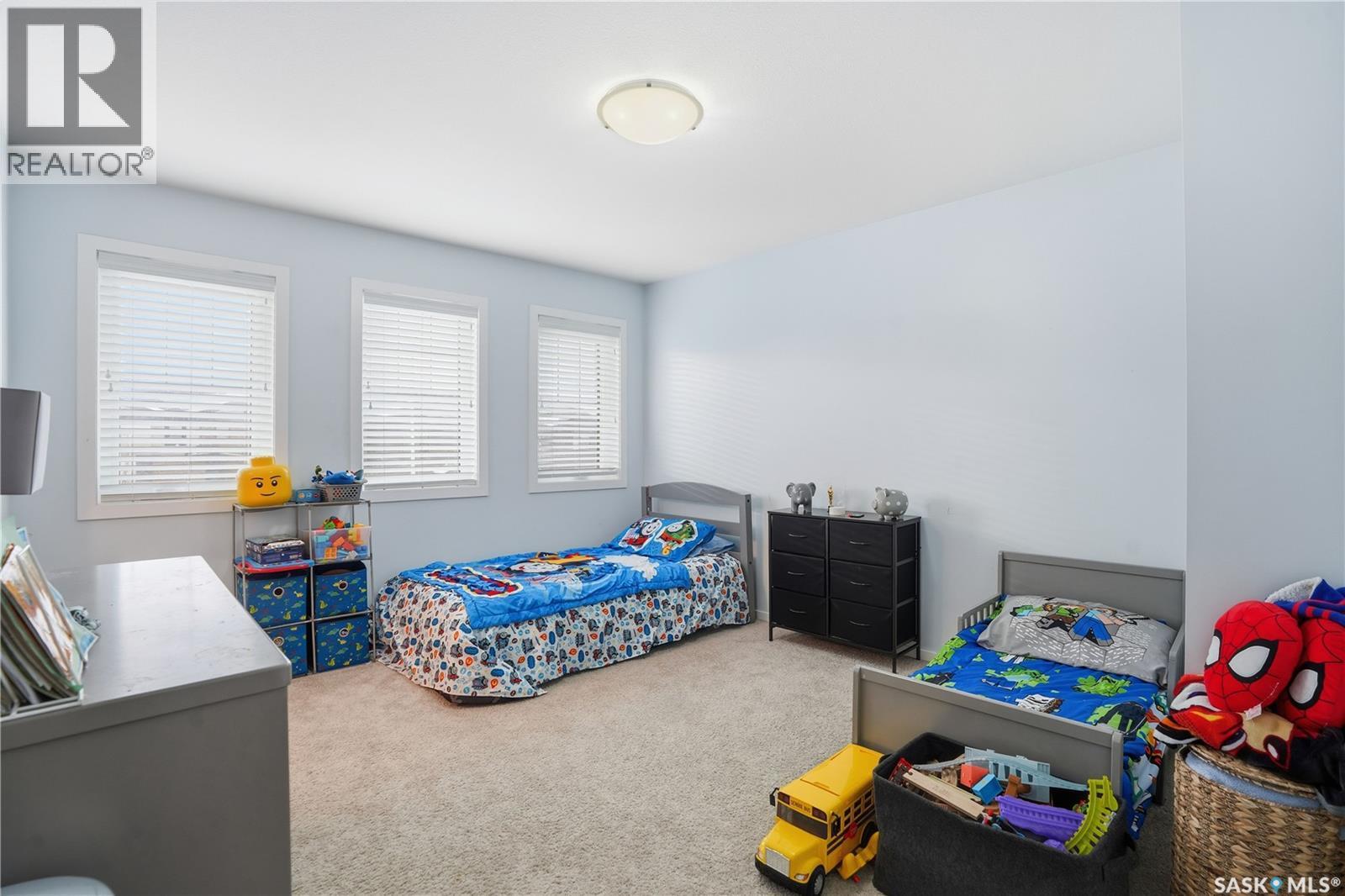 7904 Canola Avenue, Regina, SK - Indoor Photo Showing Bedroom