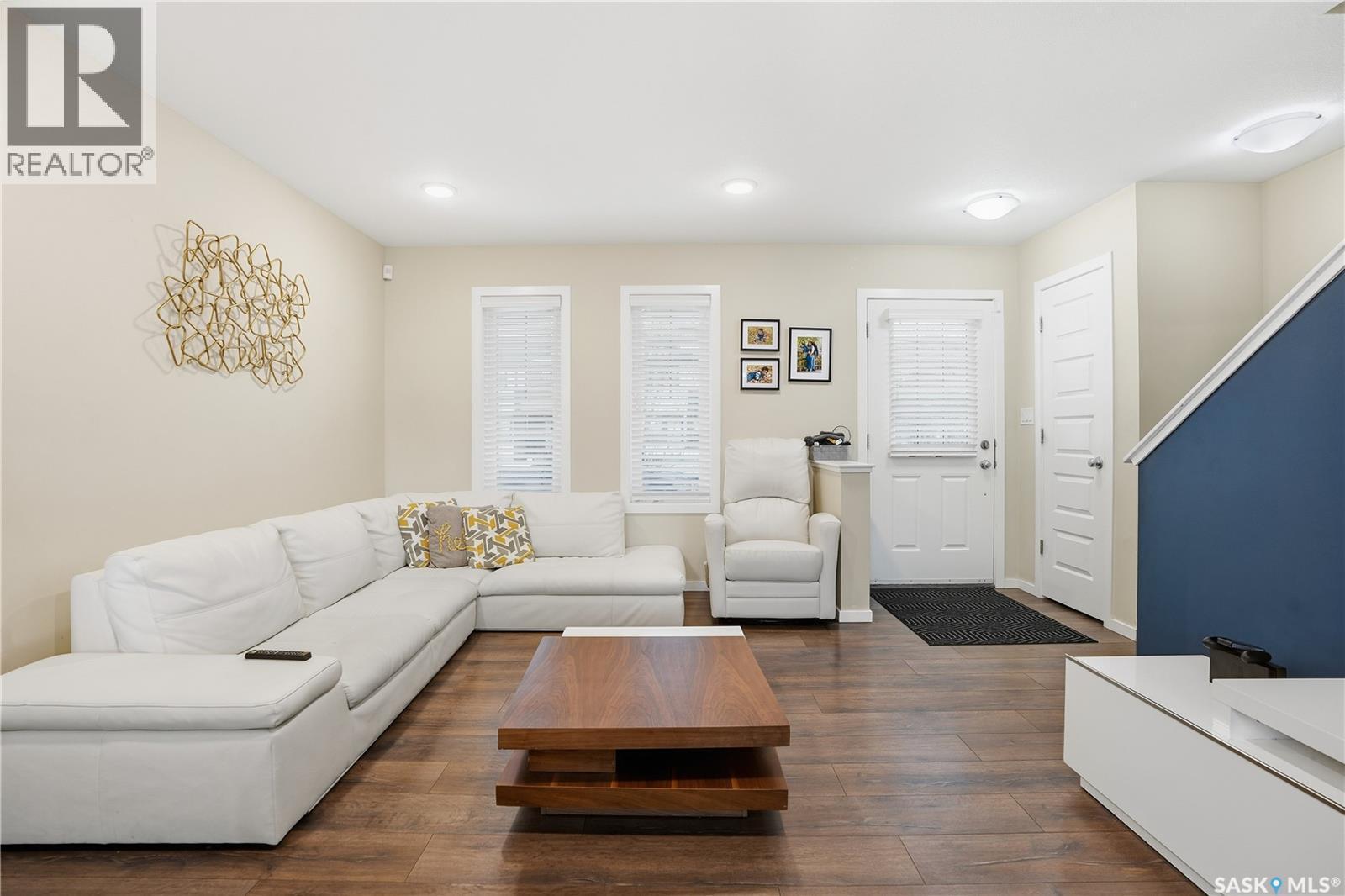 7904 Canola Avenue, Regina, SK - Indoor Photo Showing Living Room