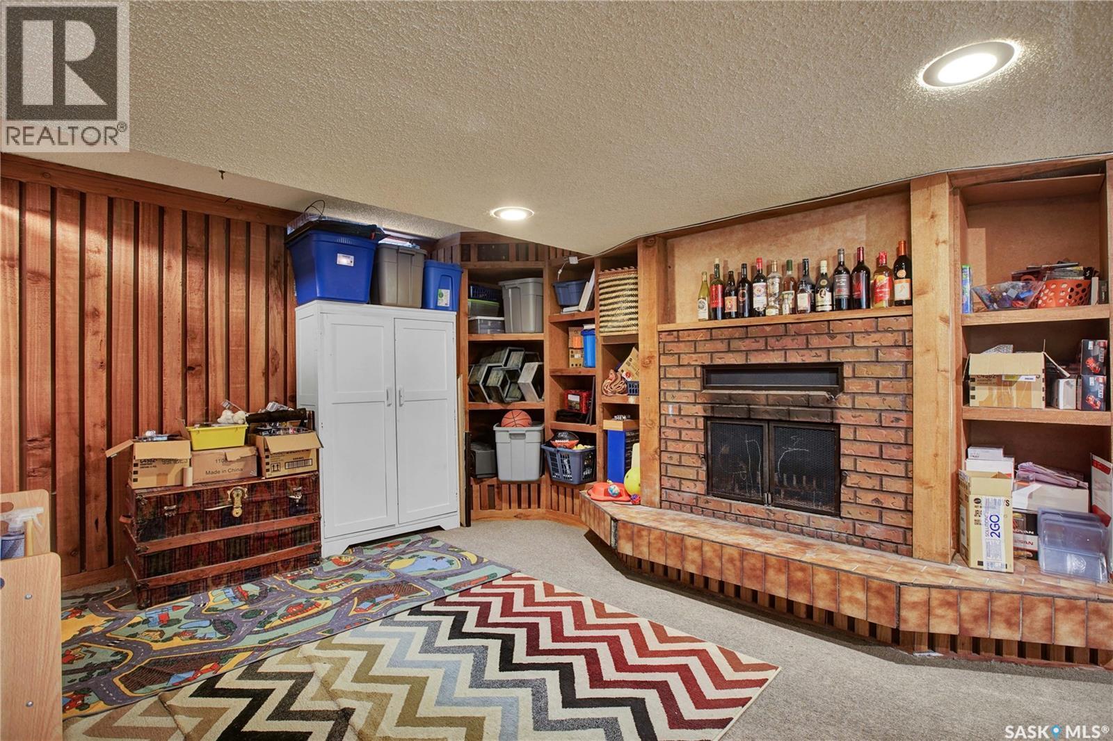 97 Mcgee Crescent, Saskatoon, SK - Indoor With Fireplace