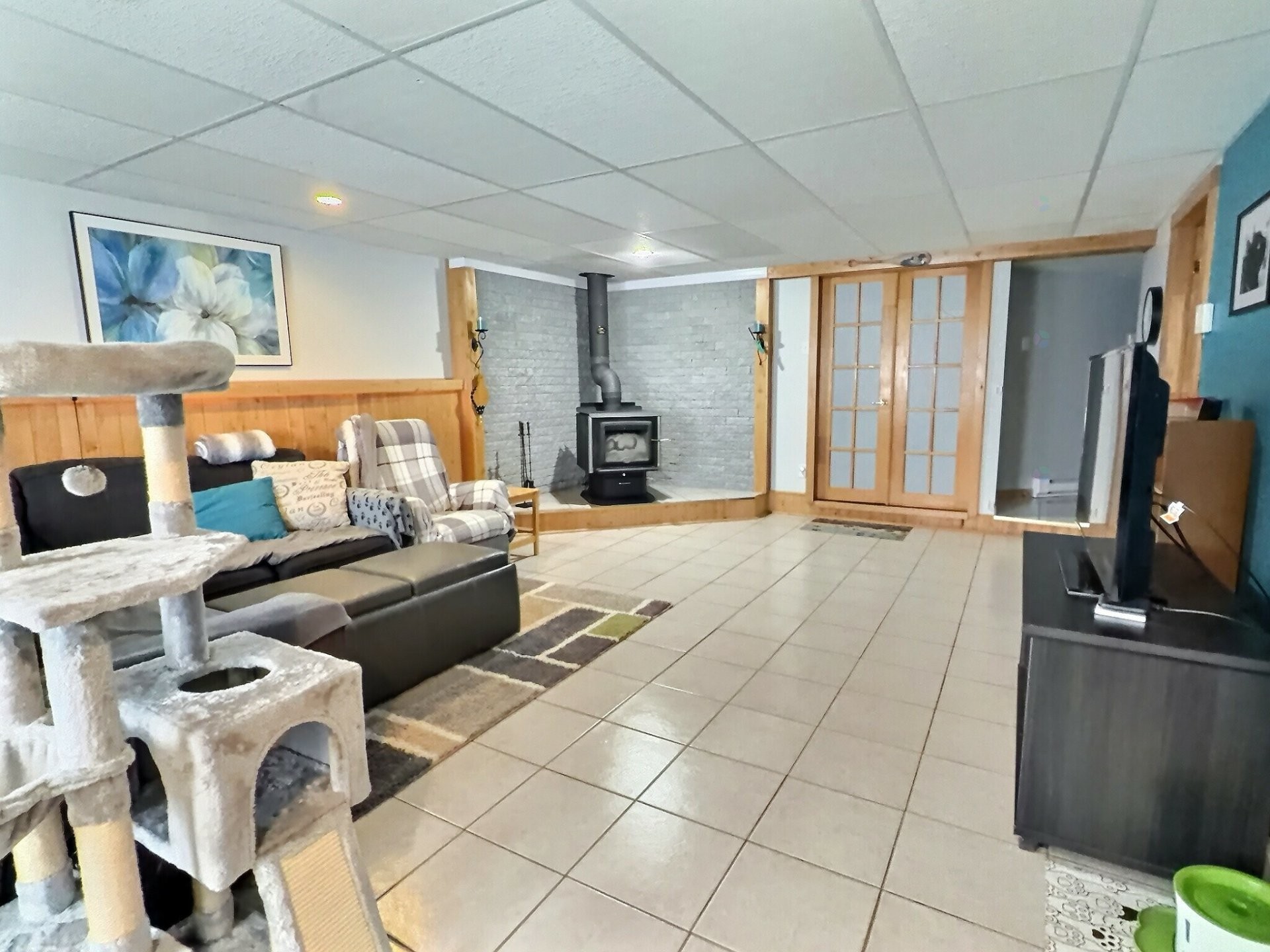 Family Room - 762 Rue Principale, Rémigny, QC - Indoor With Fireplace