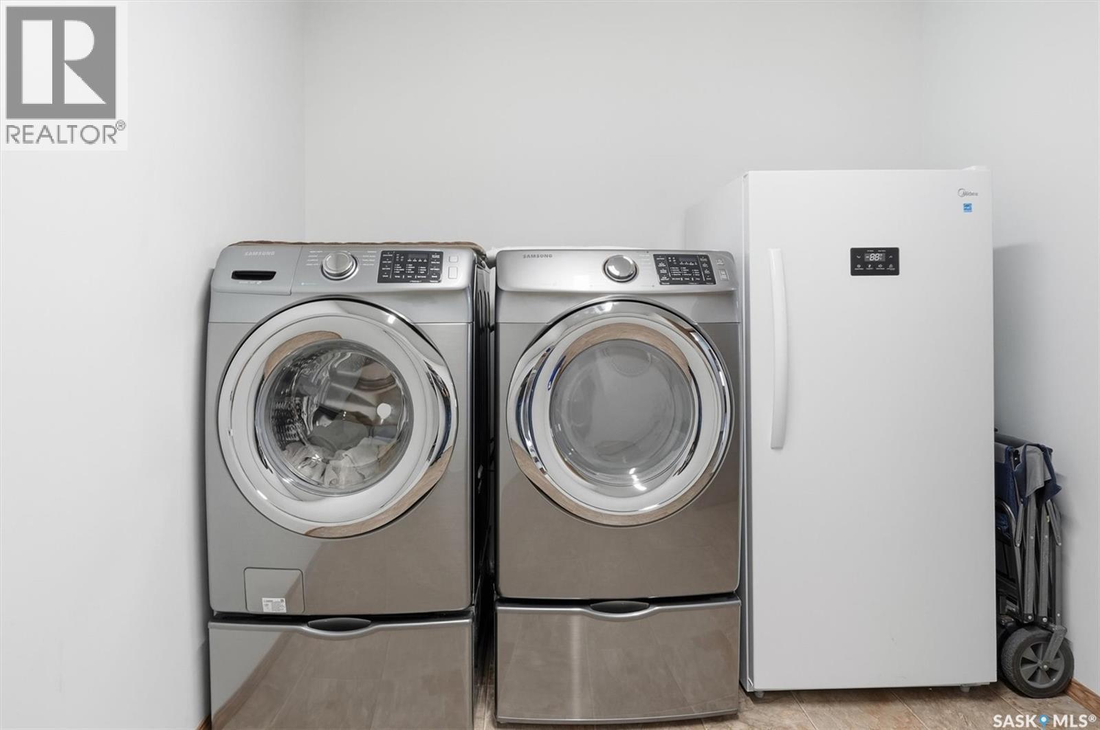 201 103 Keevil Crescent, Saskatoon, SK - Indoor Photo Showing Laundry Room