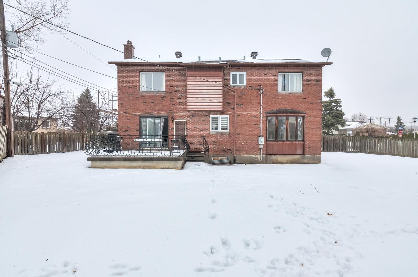 Back facade - 34 Rue Valmount, Dollard-Des-Ormeaux, QC - Outdoor With Exterior