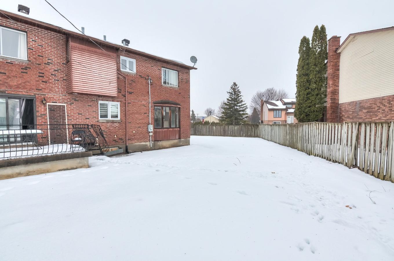 Backyard - 34 Rue Valmount, Dollard-Des-Ormeaux, QC - Outdoor With Exterior