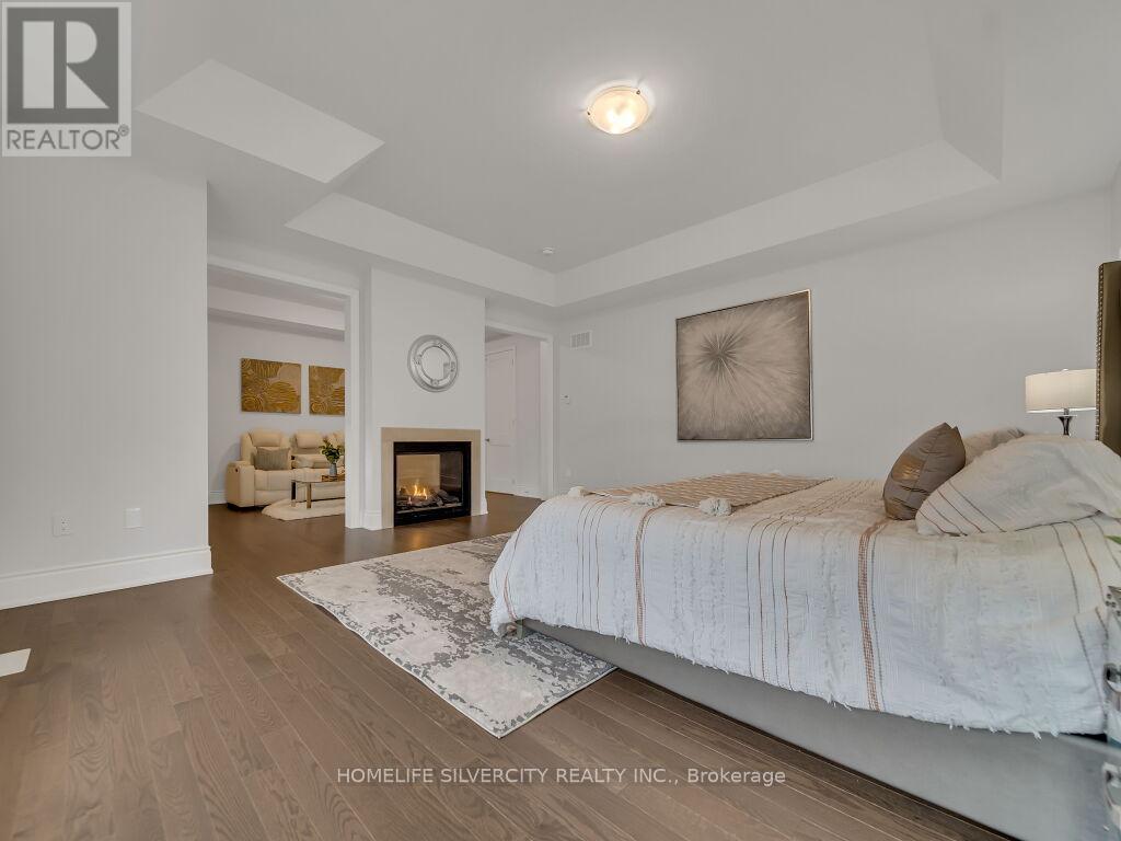 2 Endless Circle, Vaughan, ON - Indoor Photo Showing Bedroom With Fireplace