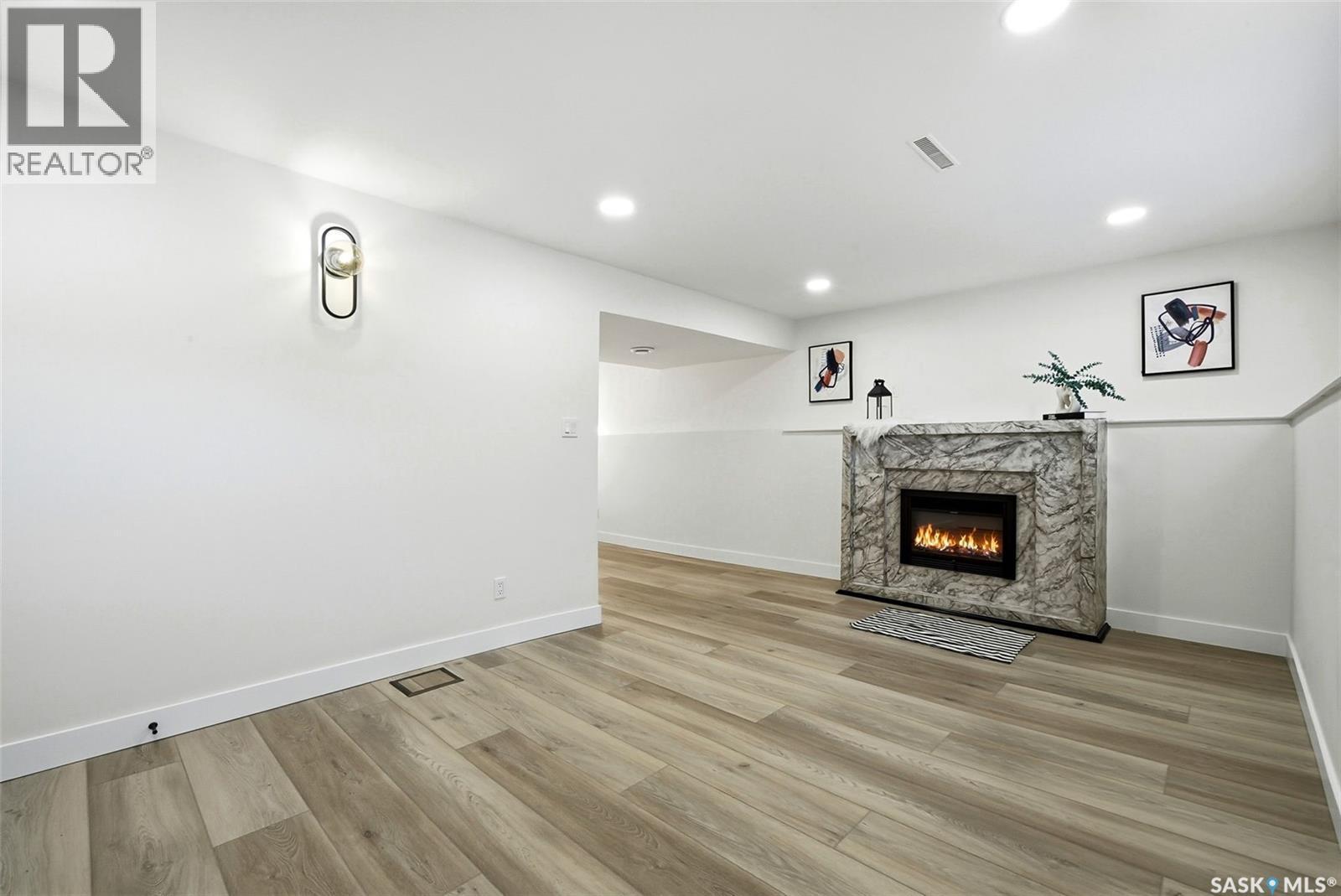 96 Bobolink Bay, Regina, SK - Indoor With Fireplace