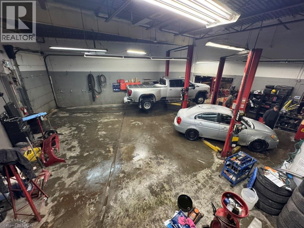 Garage featuring concrete block wall - 1659 Victoria Street N, Kitchener, ON