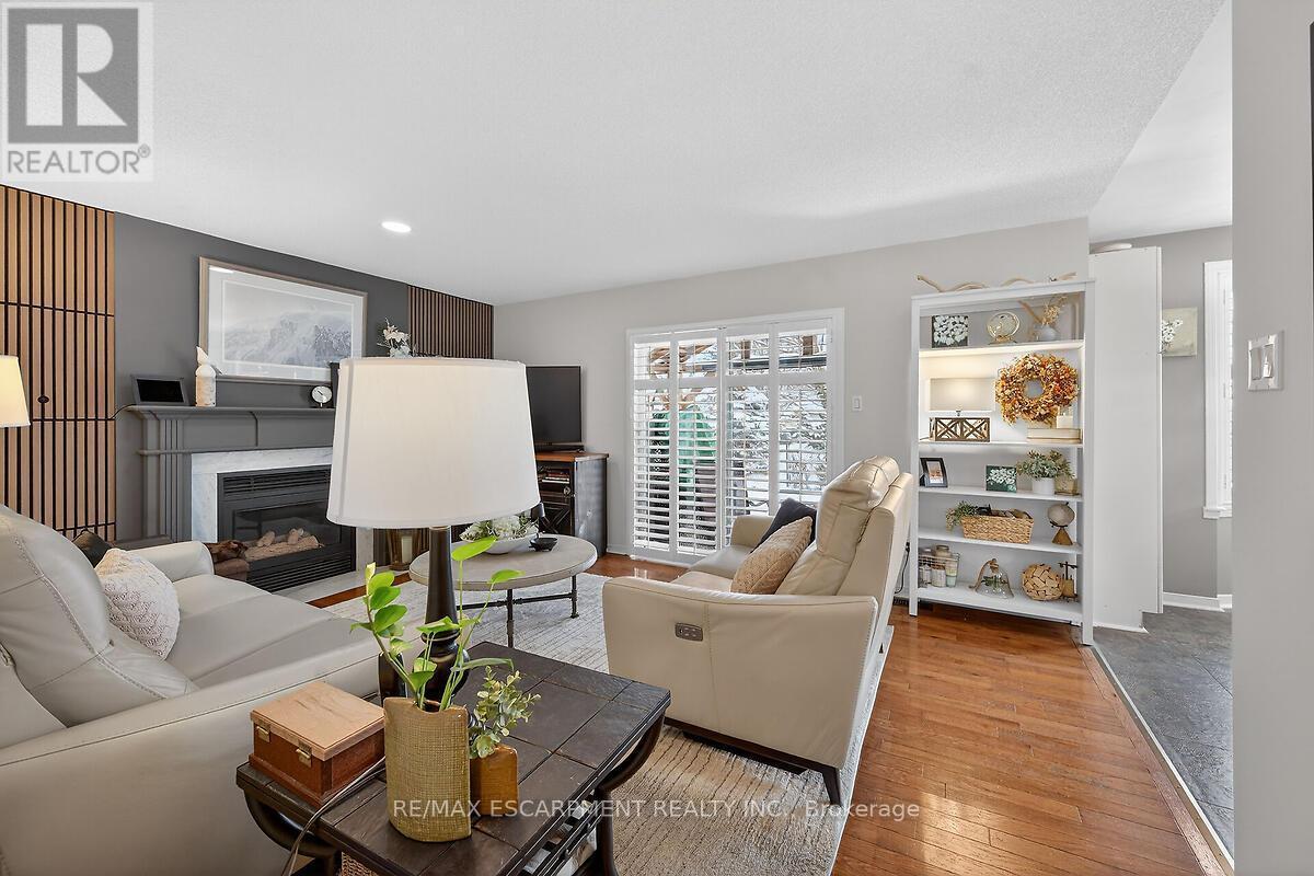 8316 Twenty Road E, Hamilton, ON - Indoor Photo Showing Living Room With Fireplace