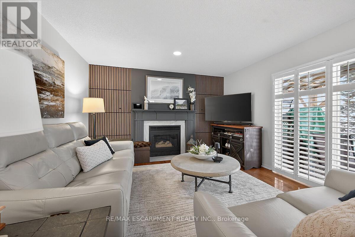 8316 Twenty Road E, Hamilton, ON - Indoor Photo Showing Living Room With Fireplace