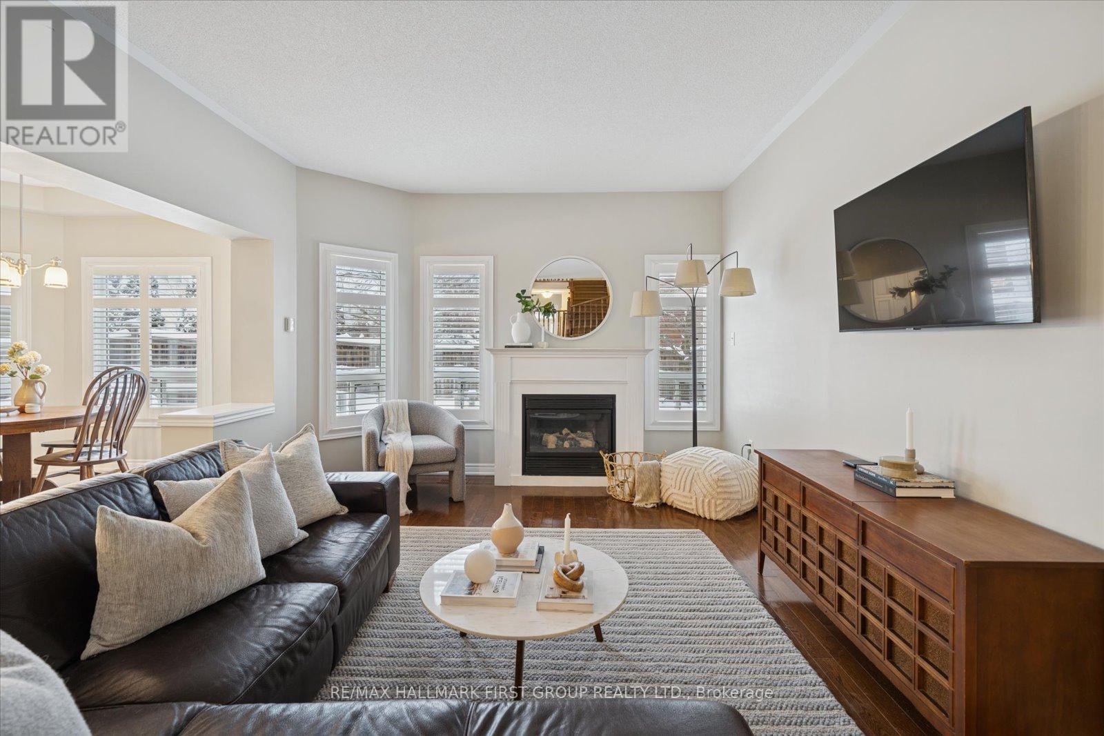 19 Elder Crescent, Whitby, ON - Indoor Photo Showing Living Room With Fireplace