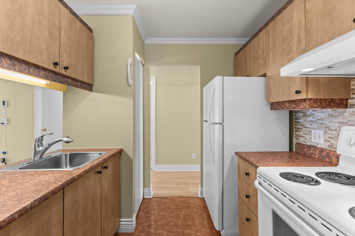 Cuisine - 102-5359 Rue Du Bocage, Terrebonne (La Plaine), QC - Indoor Photo Showing Kitchen