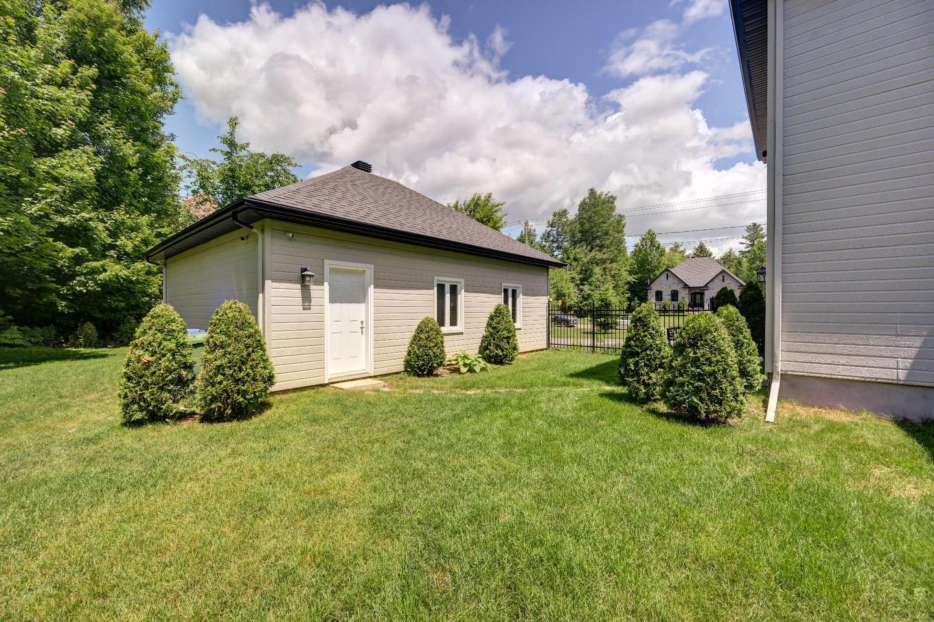 Garage - 199 Rue Du Bonniebrook, Saint-Colomban, QC - Outdoor With Exterior