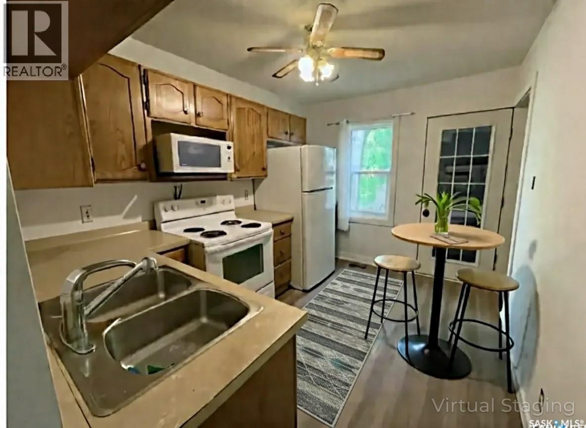 2172 Wallace Street, Regina, SK - Indoor Photo Showing Kitchen With Double Sink