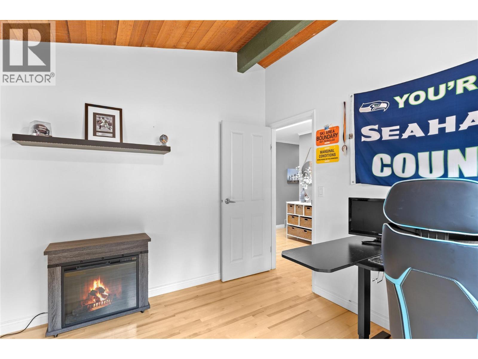 11609 Upper Summit Drive, Coldstream, BC - Indoor With Fireplace