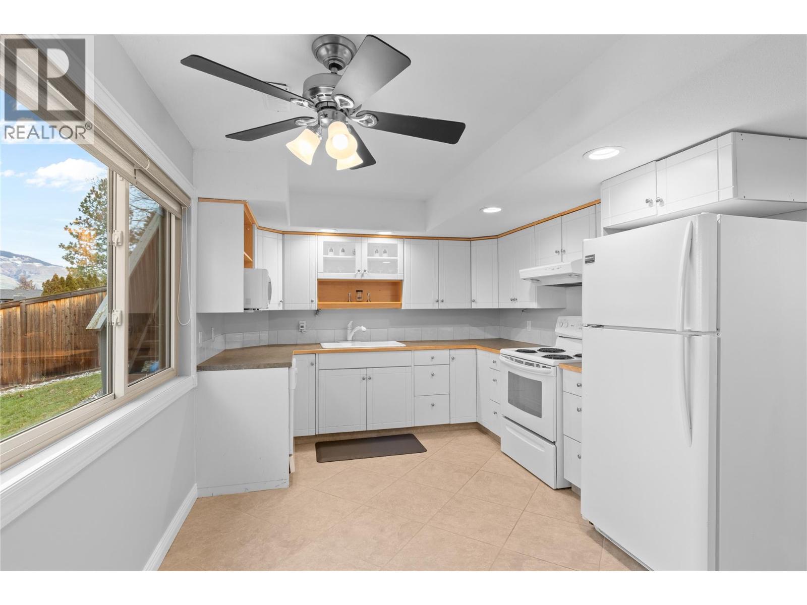 Kitchen in the in-law suite - 11609 Upper Summit Drive, Coldstream, BC - Indoor Photo Showing Kitchen