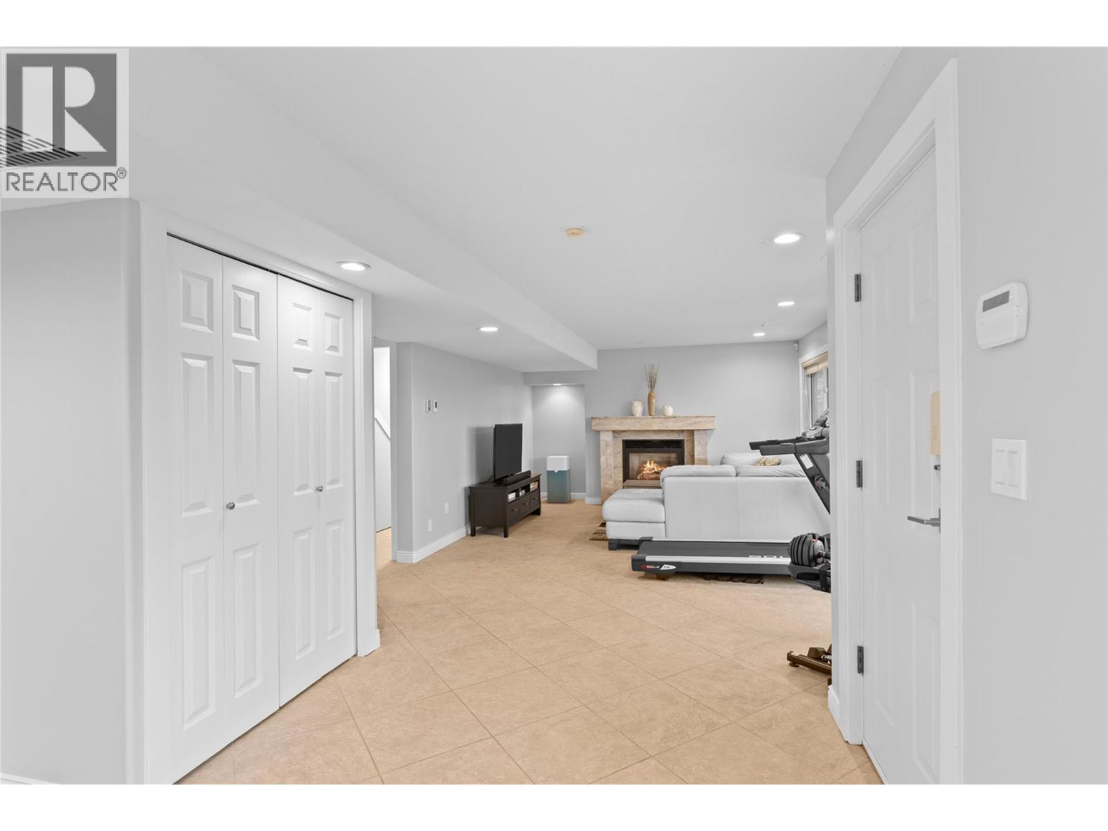 Looking to Rec room - 11609 Upper Summit Drive, Coldstream, BC - Indoor Photo Showing Other Room