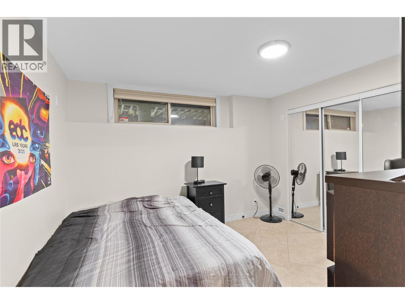 Bedroom in the in-law suite - 11609 Upper Summit Drive, Coldstream, BC - Indoor Photo Showing Bedroom