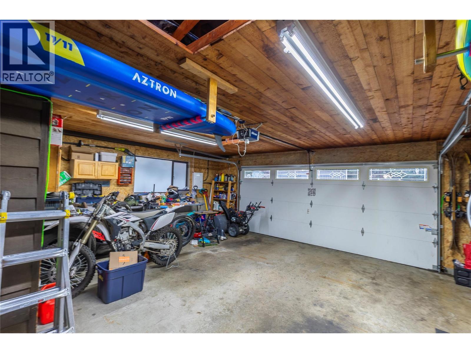 2 car garage - 11609 Upper Summit Drive, Coldstream, BC - Indoor Photo Showing Garage