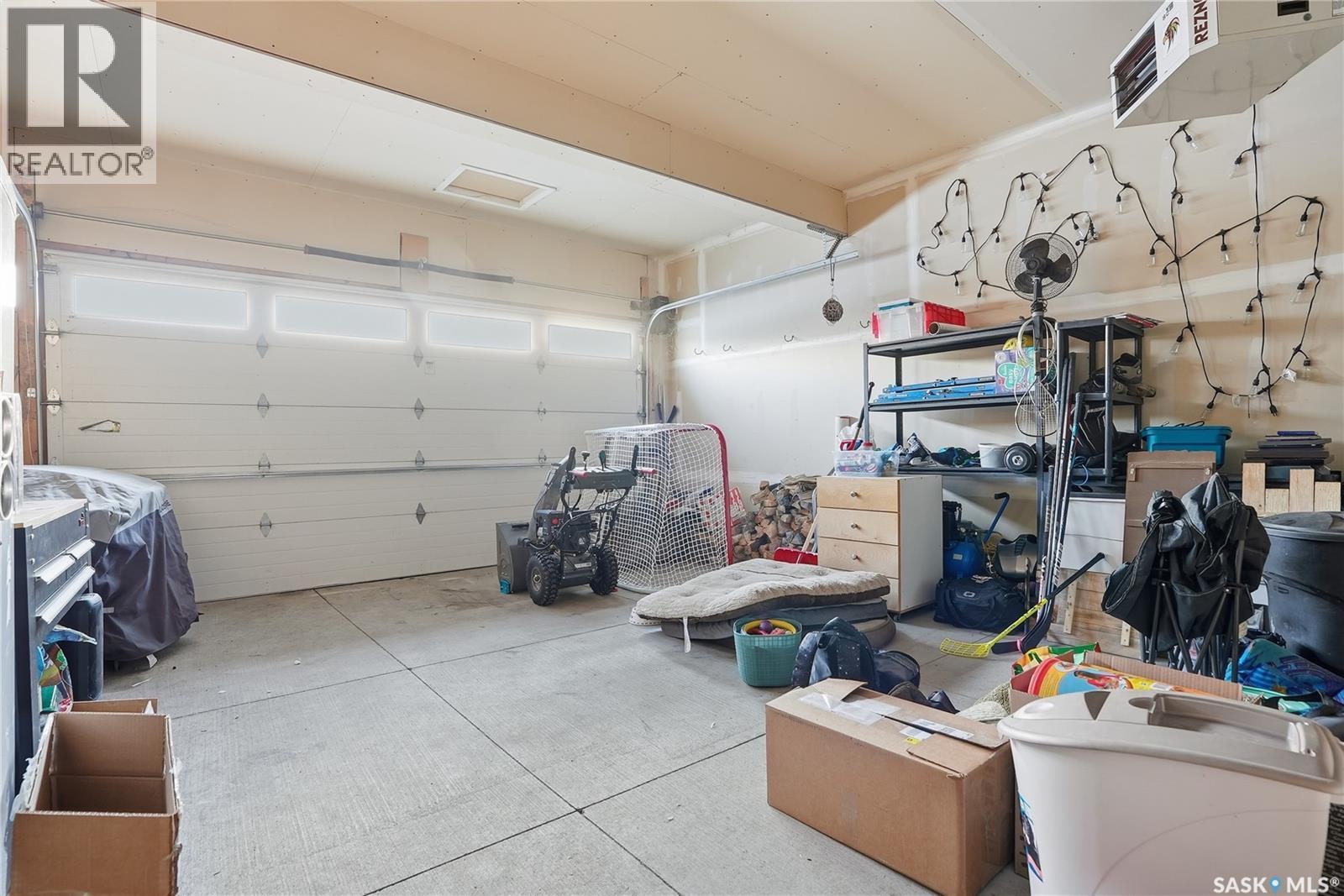 219 Henick Crescent, Saskatoon, SK - Indoor Photo Showing Garage