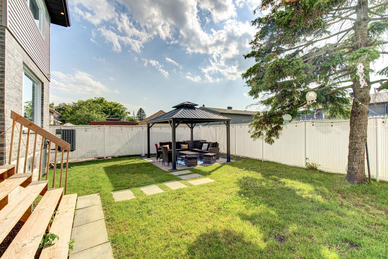 Cour - 3444 Rue Du Collège, Longueuil (Saint-Hubert), QC - Outdoor With Backyard