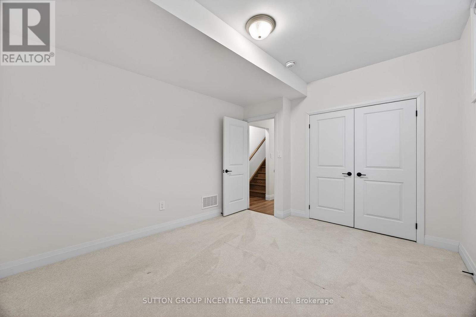 LOWER LEVEL 3RD BEDROOM - 123 Ritchie Crescent, Springwater, ON - Indoor Photo Showing Other Room
