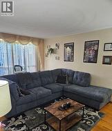 Living room with wood finished floors -