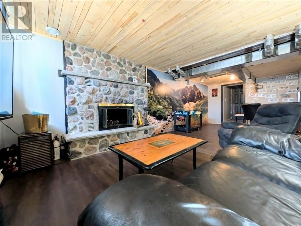 486 Bois, Espanola, ON - Indoor Photo Showing Living Room With Fireplace