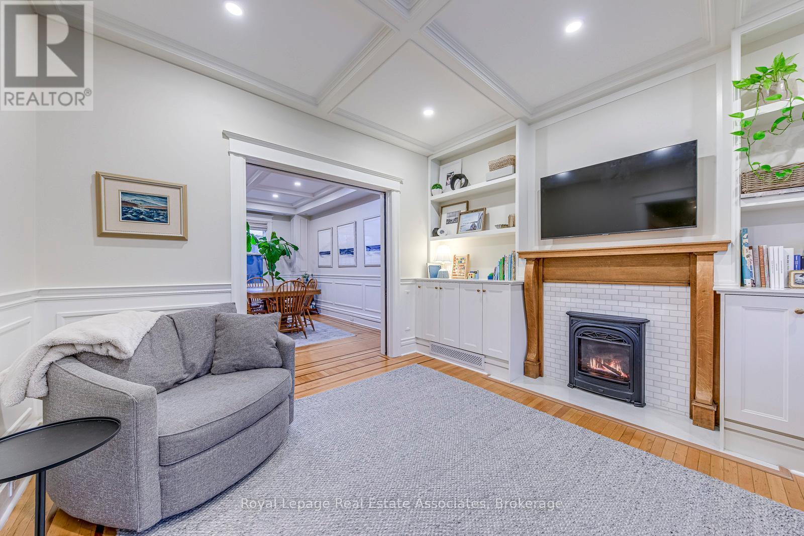 23 Fairholt Road N, Hamilton, ON - Indoor Photo Showing Living Room With Fireplace