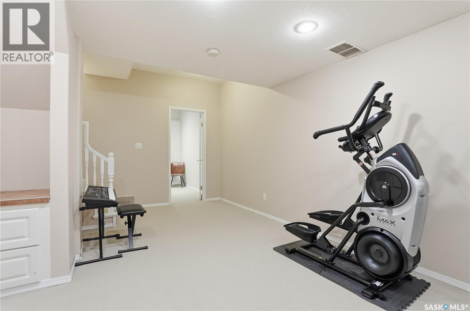215 Wickenden Crescent, Saskatoon, SK - Indoor Photo Showing Gym Room