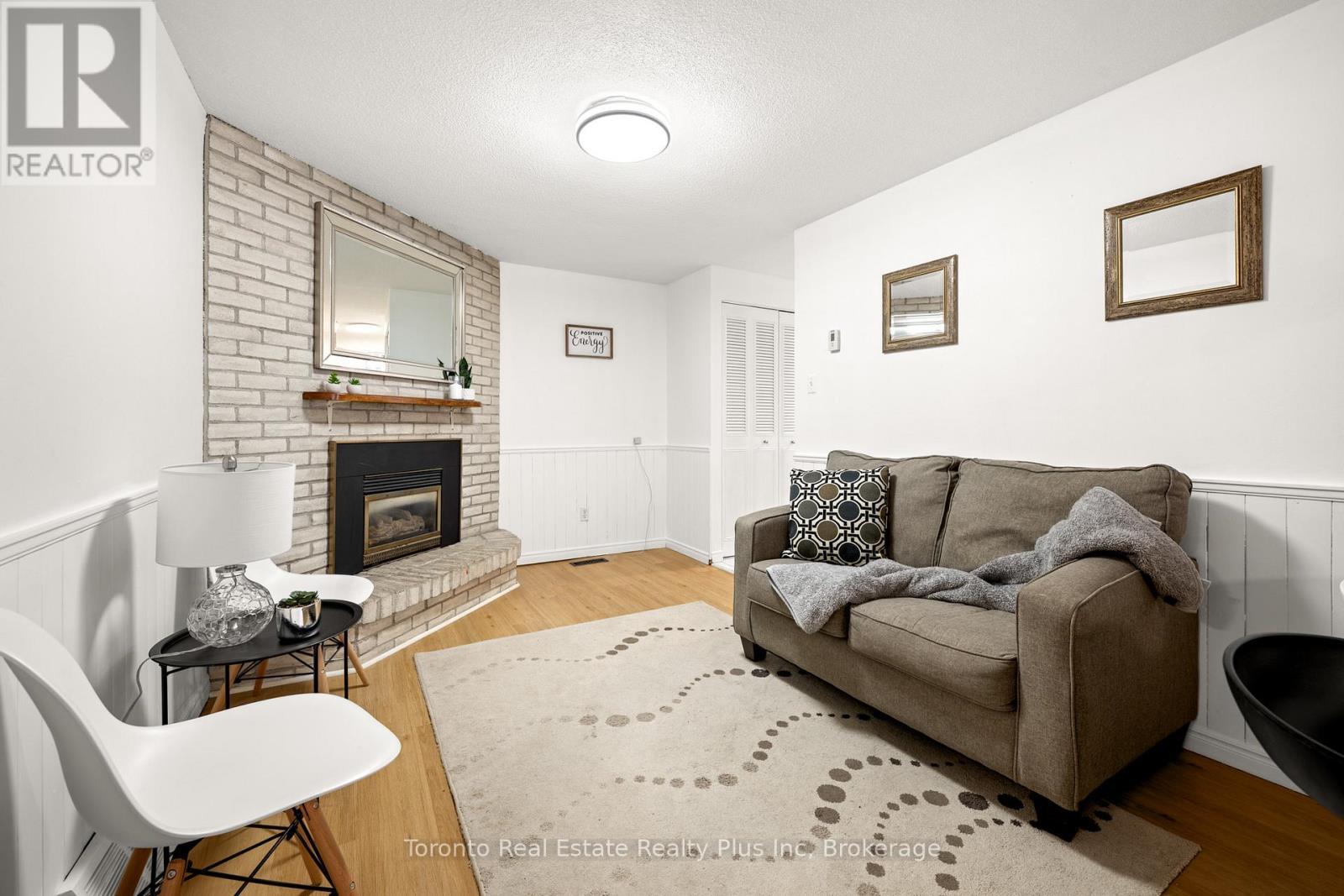 134 Pepperwood Crescent, Kitchener, ON - Indoor Photo Showing Living Room With Fireplace