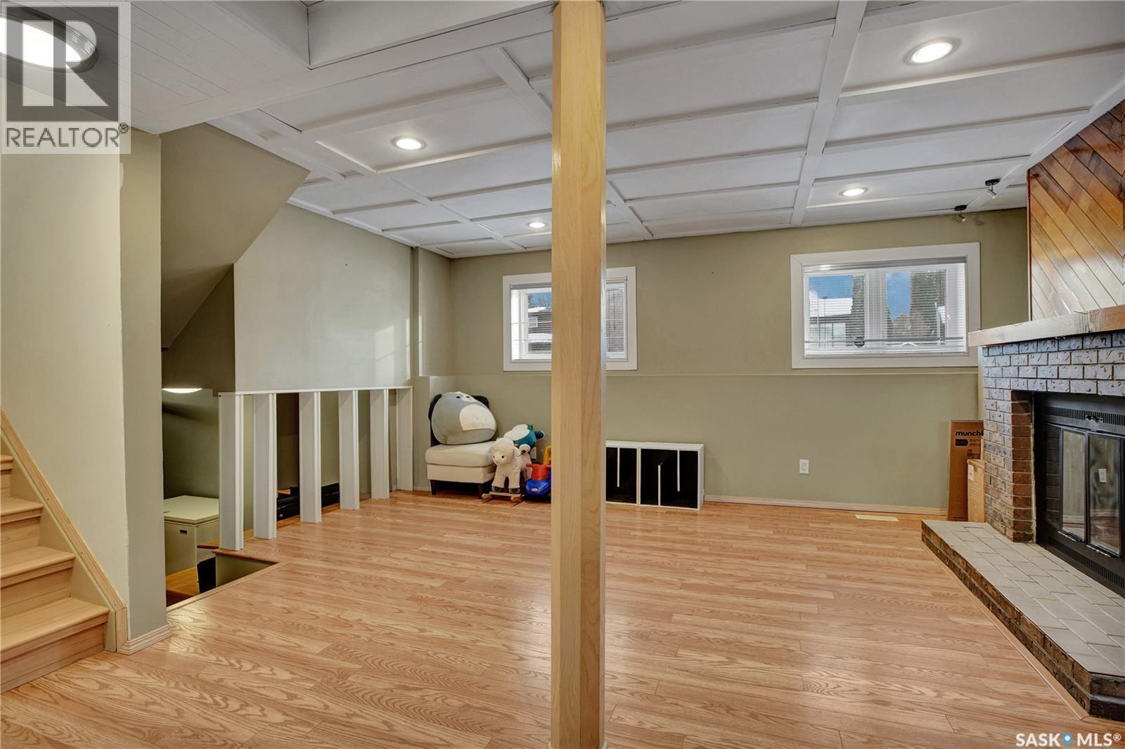 534 David Knight Way, Saskatoon, SK - Indoor Photo Showing Other Room With Fireplace