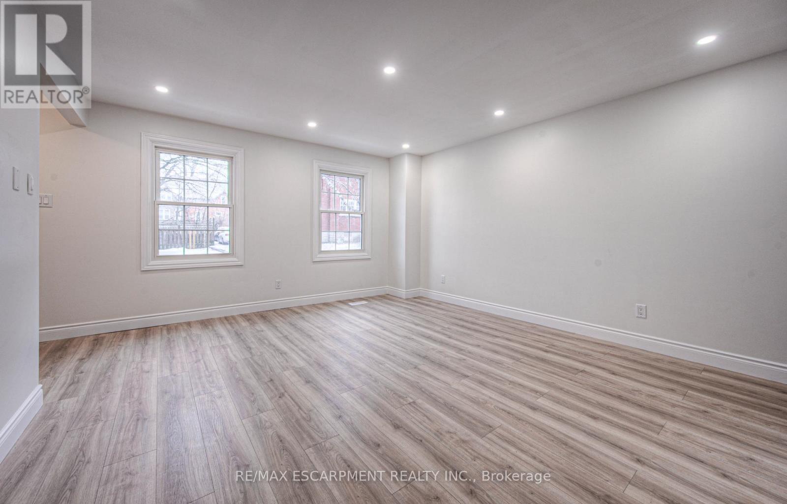 large living room - 30 Young Street W, Waterloo, ON - Indoor Photo Showing Other Room