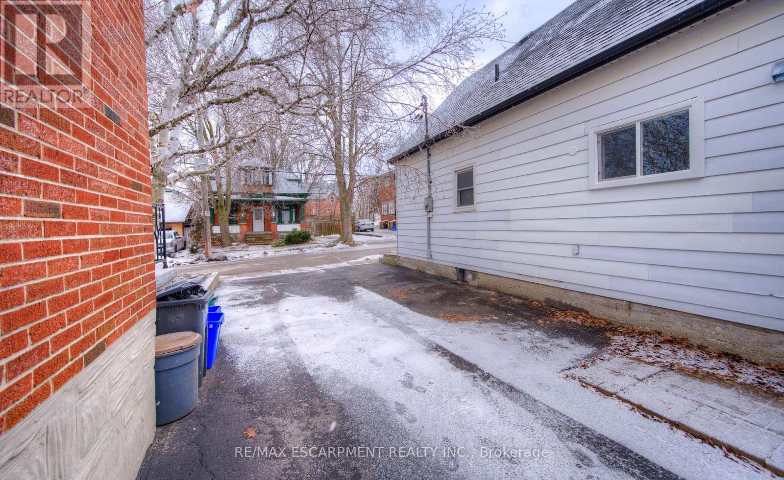 Parking for 2 cars - 30 Young Street W, Waterloo, ON - Outdoor With Exterior