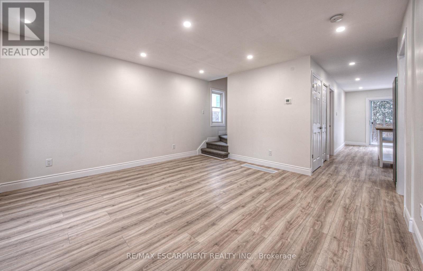 potlights throughout main level - 30 Young Street W, Waterloo, ON - Indoor Photo Showing Other Room