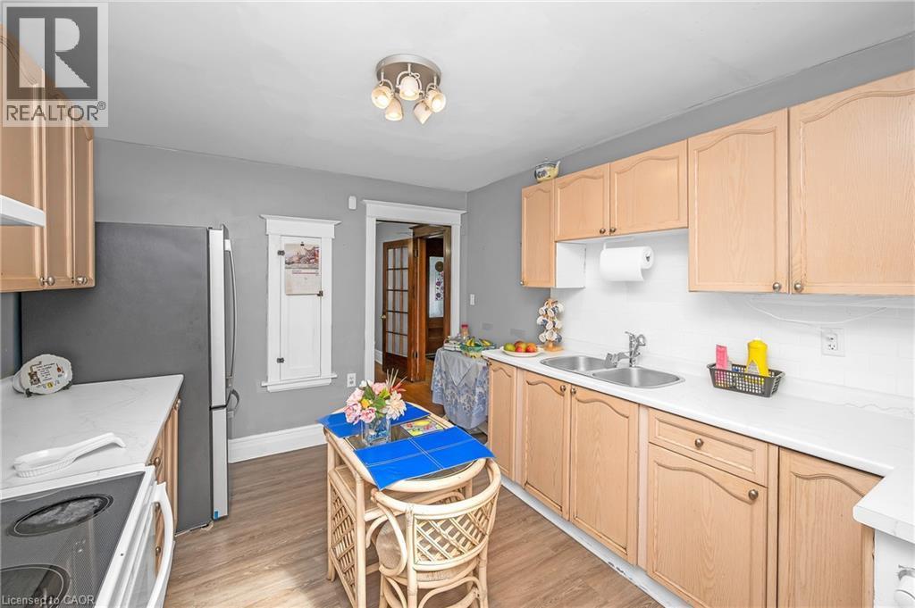 1088 King Street E, Hamilton, ON - Indoor Photo Showing Kitchen With Double Sink