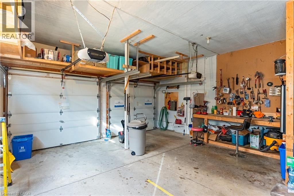 double car garage - 569 Rosseau Road, Hamilton, ON - Indoor Photo Showing Garage