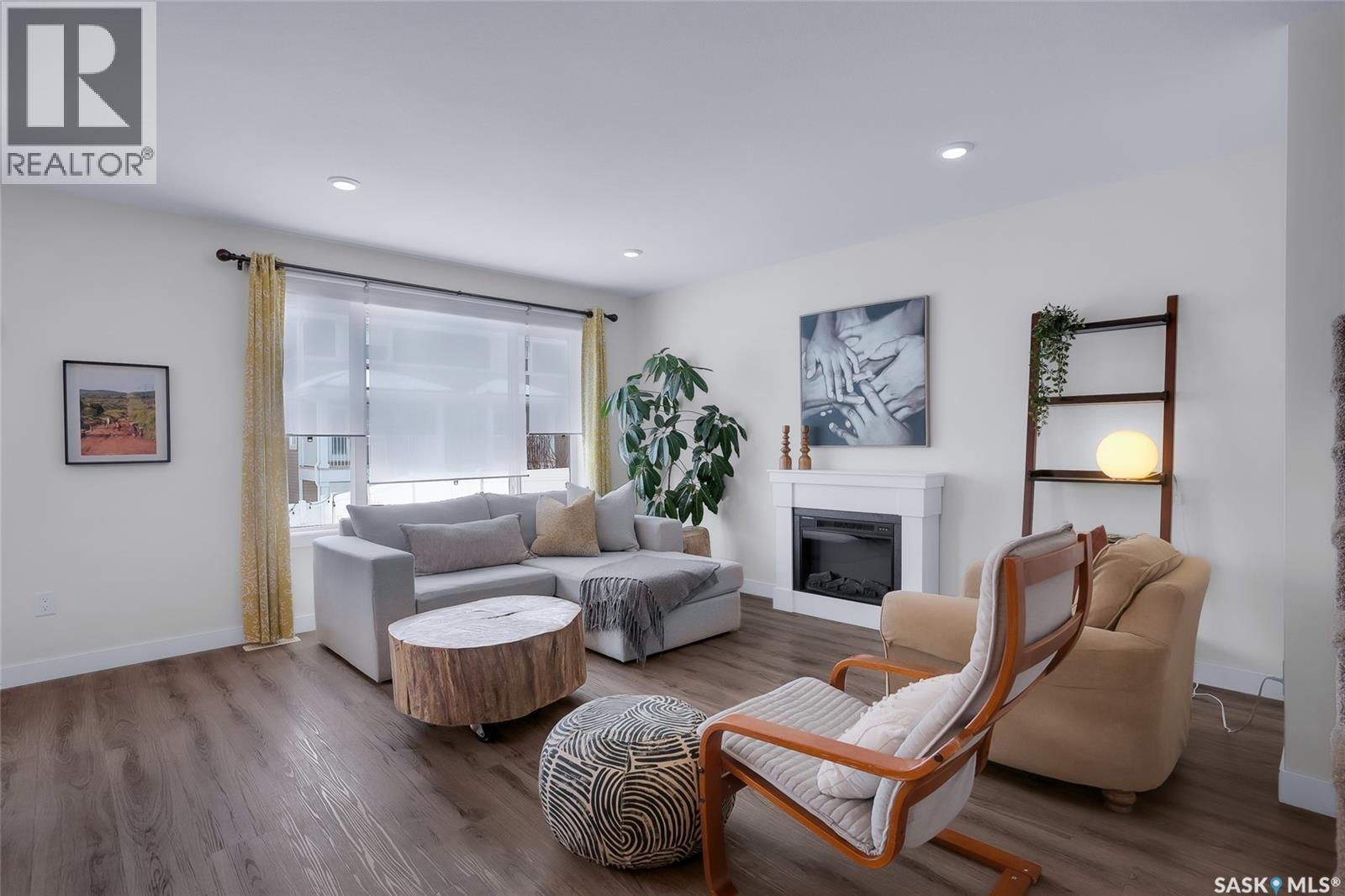 1059 Kolynchuk Crescent, Saskatoon, SK - Indoor Photo Showing Living Room With Fireplace