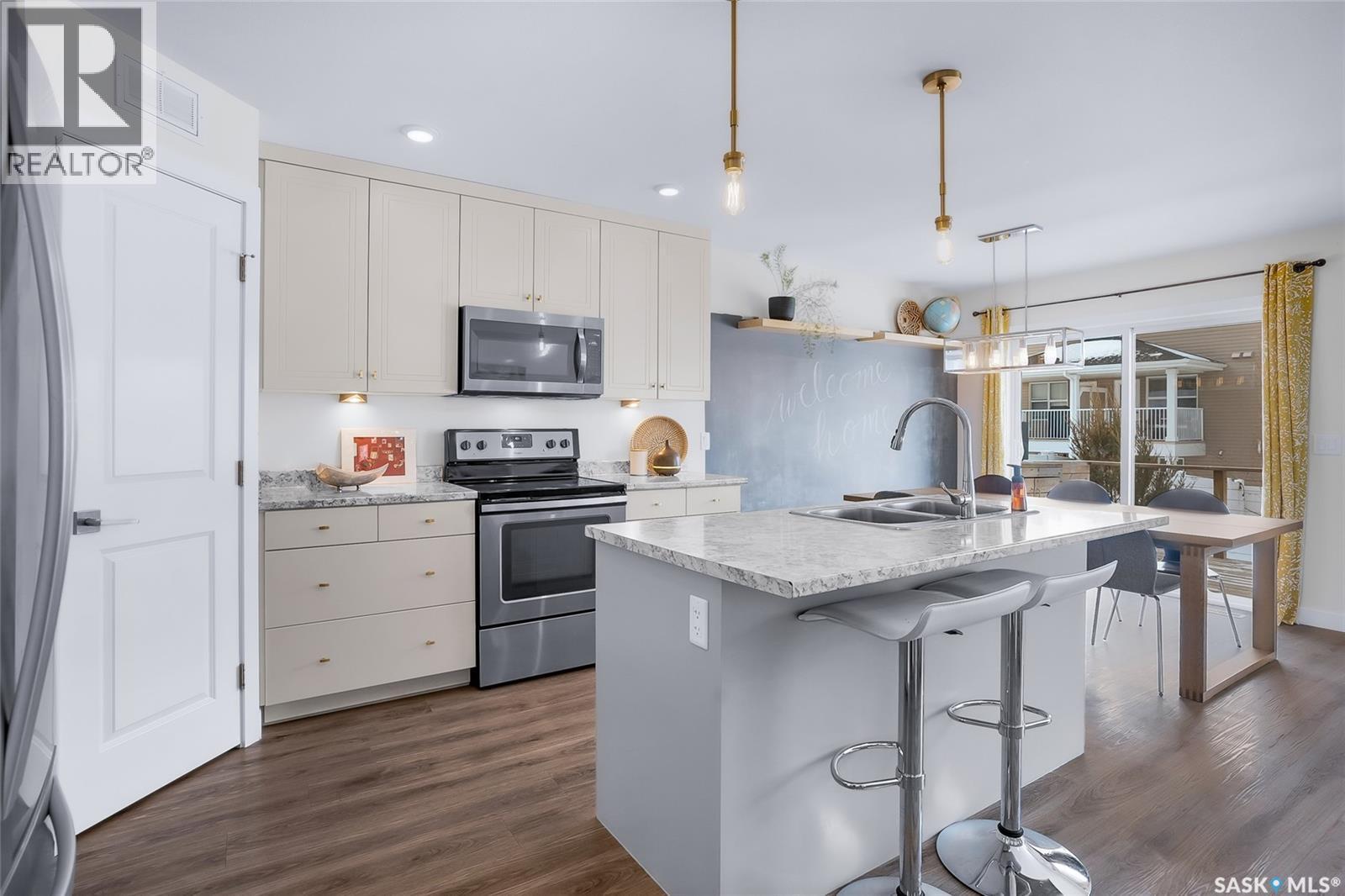 1059 Kolynchuk Crescent, Saskatoon, SK - Indoor Photo Showing Kitchen With Stainless Steel Kitchen With Double Sink With Upgraded Kitchen