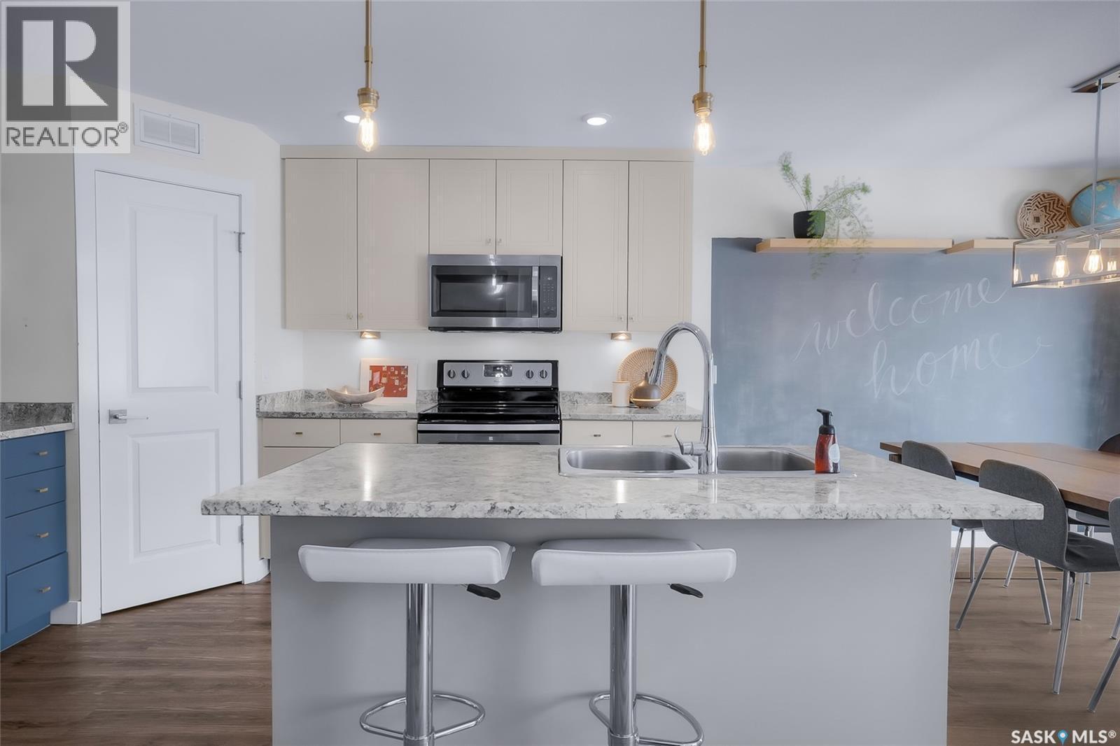 1059 Kolynchuk Crescent, Saskatoon, SK - Indoor Photo Showing Kitchen With Double Sink With Upgraded Kitchen