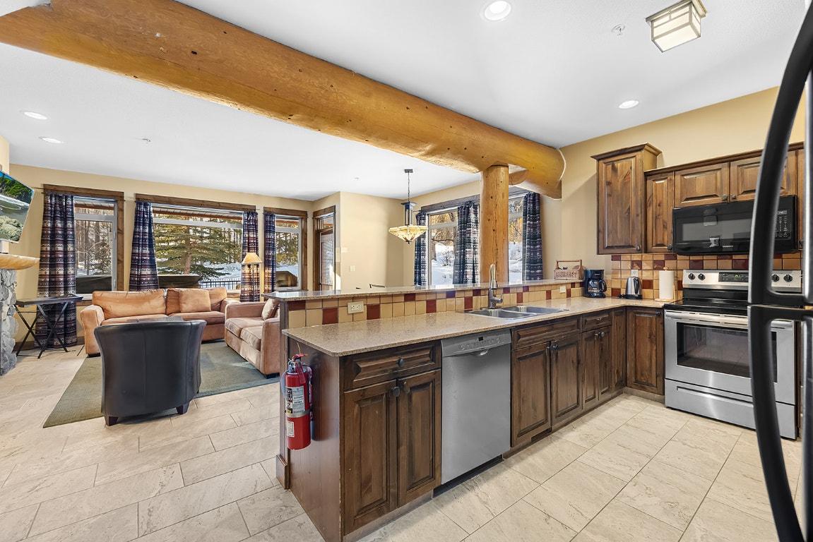 M1-A-1351 Gerry Sorensen Way, Kimberley, BC - Indoor Photo Showing Kitchen With Double Sink