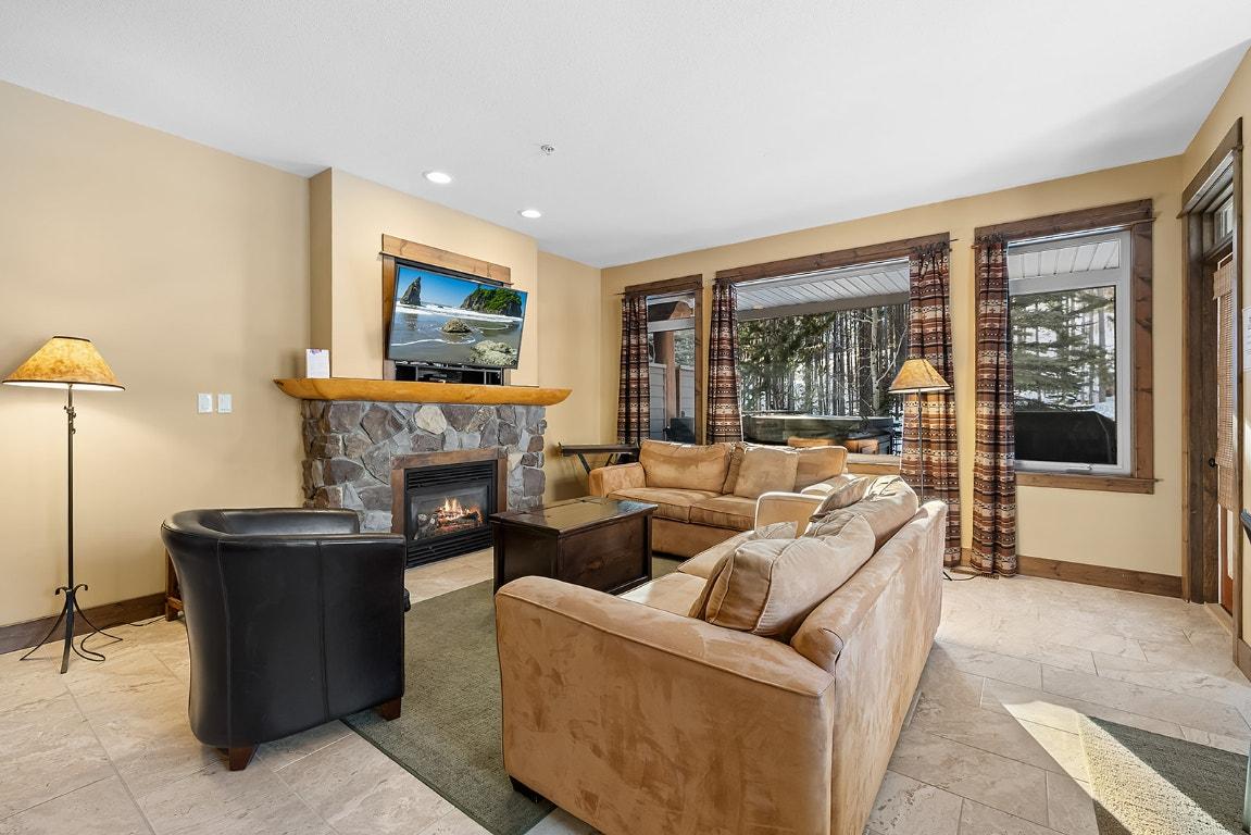 M1-A-1351 Gerry Sorensen Way, Kimberley, BC - Indoor Photo Showing Living Room With Fireplace