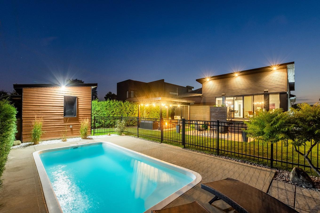 Pool - 32 Rue Des Plaines, Saint-Jean-Sur-Richelieu, QC - Outdoor With In Ground Pool With Deck Patio Veranda